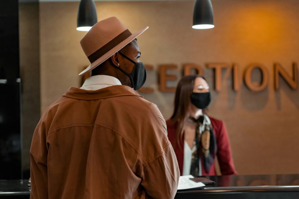 AI receptionist assisting at a front desk