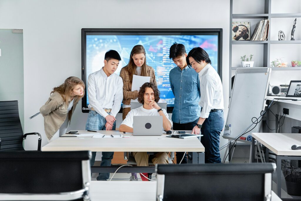 Business team discussing CRM options and features