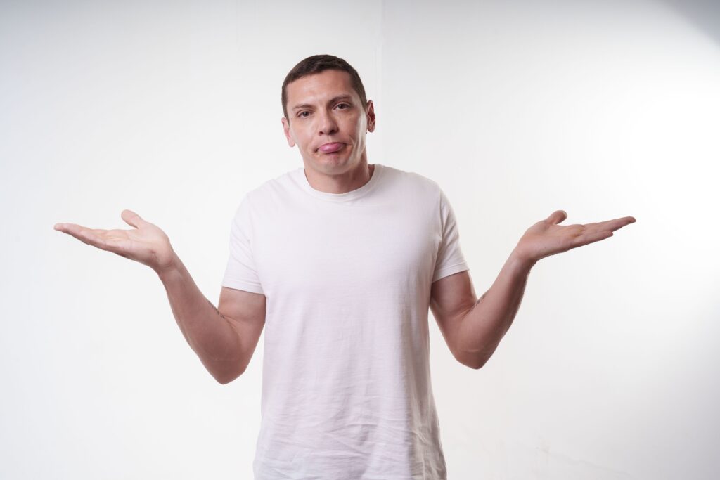 A person looking confused while writing an article